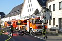 Feuer 3 Dachstuhlbrand Koeln Rath Heumar Gut Maarhausen Eilerstr P096
